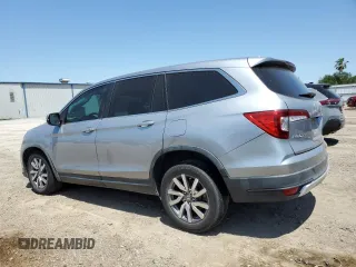 2020 Honda Pilot EX-L с VIN 5FNYF5H59LB010398, выставлен на аукционе Copart как лот 51812005 с пробегом 81 000 миль миль и Списание • Salvage title. История ставок и продаж доступна на DreamBid. Изображение 2.