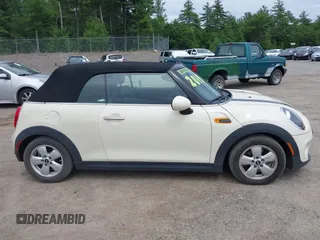 2019 MINI Convertible Cooper z VIN WMWWG5C52K3F79780, wystawiony jako IAAI lot #42622429 z przebiegiem 38 532 mil mil oraz . Historia ofert i sprzedaży dostępna na DreamBid. Obrazek 13.