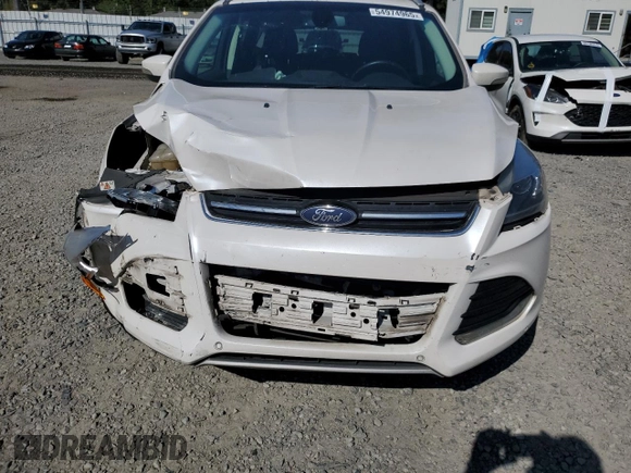 2016 Ford Escape Titanium with VIN 1FMCU9JX5GUC44579, listed as a Copart auction lot 54974965 with 113,776 mi miles and Salvage Title. Bid and sale history available at DreamBid. Image 12.