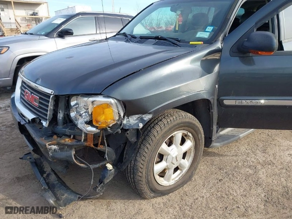 2005 GMC Envoy XL SLT with VIN 1GKET16M156142931, listed as a IAAI auction lot 41584914 with 215,452 mi miles. Bid and sale history available at carsss.com. Image 6.