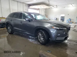 2017 Mazda CX-9 Touring with VIN JM3TCBCY5H0134295, listed as a Copart auction lot 63448185 with 174,248 mi miles and Salvage title. Bid and sale history available at DreamBid. Image 4.