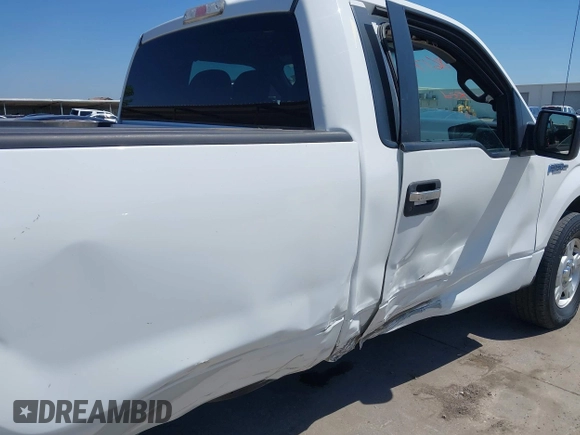 2013 Ford F-150 XL with VIN 1FTMF1CM5DKD94920, listed as a IAAI auction lot 42328617 with 126,953 mi miles and . Bid and sale history available at DreamBid. Image 12.