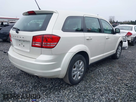2015 Dodge Journey SE z VIN 3C4PDCAB6FT736330, wystawiony jako IAAI lot #41837047 z przebiegiem 123 567 mil mil oraz . Historia ofert i sprzedaży dostępna na DreamBid. Obrazek 4.