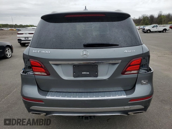 2019 Mercedes-Benz GLE 400 with VIN 4JGDA5GB4KB212891, listed as a Copart auction lot 57131075 with 77,710 mi miles and Salvage title. Bid and sale history available at DreamBid. Image 6.
