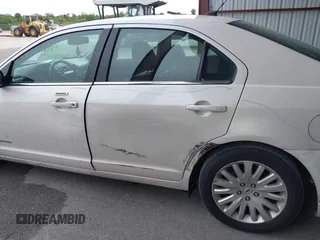 2010 Ford Fusion Hybrid with VIN 3FADP0L35AR182062, listed as a IAAI auction lot 42399945 with 101,565 mi miles and . Bid and sale history available at DreamBid. Image 12.