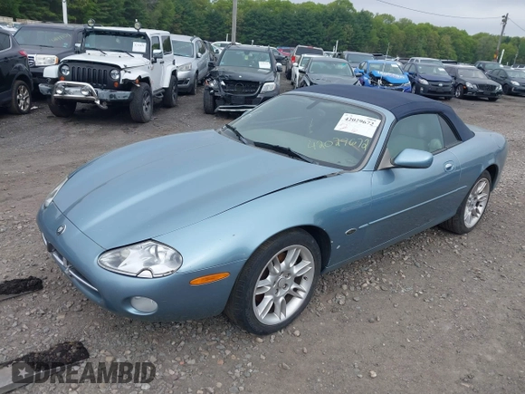 2002 Jaguar XK with VIN SAJDA42CX2NA28816, listed as a IAAI auction lot 42029672 with 130,978 mi miles and . Bid and sale history available at DreamBid. Image 2.