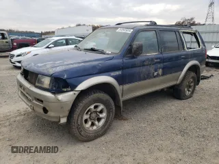 1999 Mitsubishi Montero Limited z VIN JA4LS41R5XP007663, wystawiony jako Copart lot #84892924 z przebiegiem Nie podano mil oraz Czysty tytuł • Clean title. Historia ofert i sprzedaży dostępna na DreamBid. Obrazek 1.