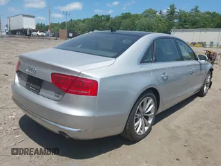 2011 Audi A8 with VIN WAURVAFD4BN019033, listed as a IAAI auction lot 42532173 with 97,486 mi miles and . Bid and sale history available at DreamBid. Image 4.