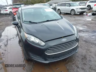 2014 Ford Fiesta SE with VIN 3FADP4BJ8EM159613, listed as a IAAI auction lot 41661005 with 100,006 mi miles. Bid and sale history available at carsss.com. Image 1.
