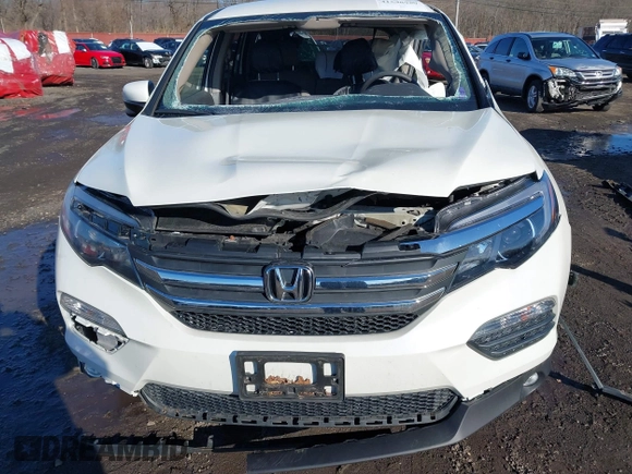 2017 Honda Pilot EX with VIN 5FNYF6H31HB051328, listed as a IAAI auction lot 41598959 with 37,799 mi miles and . Bid and sale history available at DreamBid. Image 11.