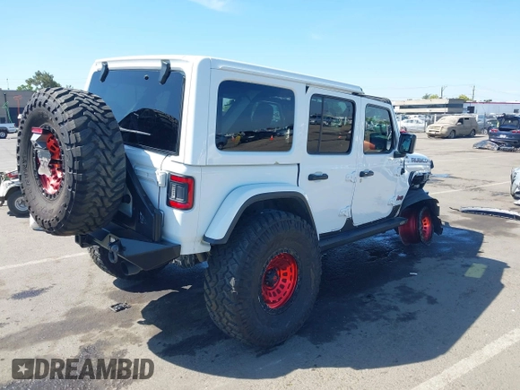 2018 Jeep Wrangler Unlimited Rubicon with VIN 1C4HJXFGXJW110629, listed as a IAAI auction lot 42141572 with 65,973 mi miles and . Bid and sale history available at DreamBid. Image 4.
