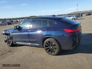 2022 BMW X4 M40i with VIN 5UX43DT02N9K31818, listed as a Copart auction lot 38495943 with 12,673 mi miles. Bid and sale history available at carsss.com. Image 2.