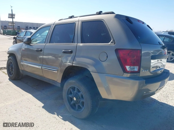 2005 Jeep Grand Cherokee Laredo with VIN 1J4HR48N35C647637, listed as a IAAI auction lot 38514345 with 167,342 mi miles. Bid and sale history available at carsss.com. Image 3.