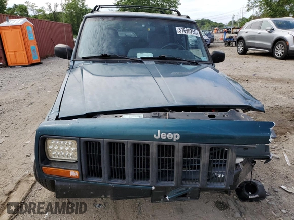 1998 Jeep Cherokee Sport z VIN 1J4FJ68S4WL101110, wystawiony jako Copart lot #57696755 z przebiegiem 218 254 mil mil oraz Szkoda całkowita • Salvage title. Historia ofert i sprzedaży dostępna na DreamBid. Obrazek 5.