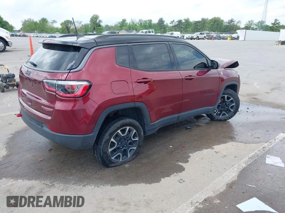 2021 Jeep Compass Trailhawk with VIN 3C4NJDDB6MT502932, listed as a IAAI auction lot 42209945 with 63,119 mi miles and . Bid and sale history available at DreamBid. Image 4.