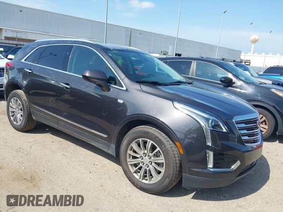 2018 Cadillac XT5 Luxury AWD z VIN 1GYKNDRS0JZ209266, wystawiony jako IAAI lot #42454536 z przebiegiem 52 839 mil mil oraz . Historia ofert i sprzedaży dostępna na DreamBid. Obrazek 1.