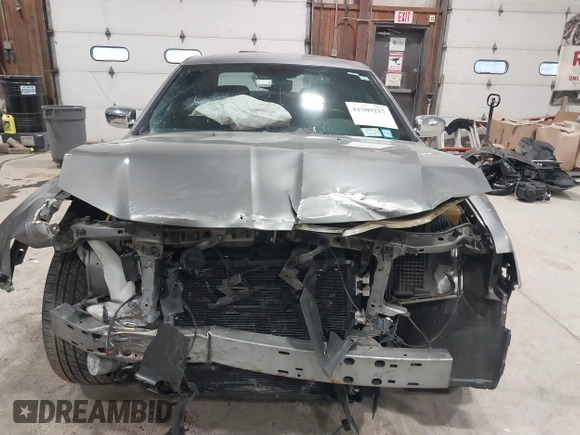 2012 Chrysler 300 Limited with VIN 2C3CCAHG4CH184942, listed as a IAAI auction lot 41509217 with 93,081 mi miles and . Bid and sale history available at DreamBid. Image 13.