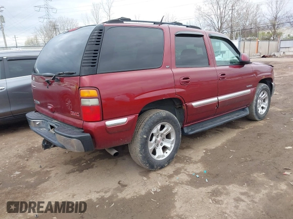 2001 GMC Yukon SLT with VIN 1GKEK13T71J198393, listed as a IAAI auction lot 41898293 with 230,055 mi miles. Bid and sale history available at carsss.com. Image 4.