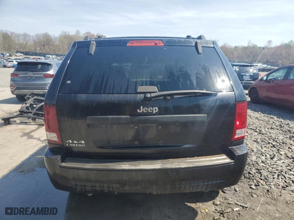 2008 Jeep Grand Cherokee Laredo with VIN 1J8GR48K98C205367, listed as a Copart auction lot 53567515 with 144,767 mi miles and Salvage Title. Bid and sale history available at carsss.com. Image 6.