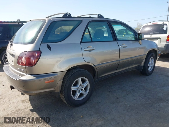 1999 Lexus RX 300 with VIN JT6HF10U6X0092078, listed as a IAAI auction lot 41988259 with 144,148 mi miles and . Bid and sale history available at DreamBid. Image 4.