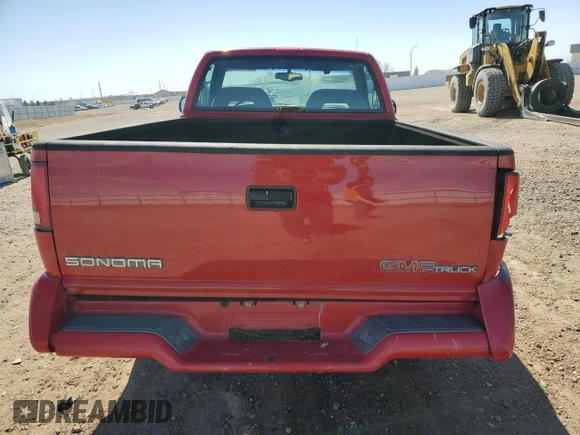 1995 GMC Sonoma z VIN 1GTCS144XS8524819, wystawiony jako Copart lot #52608765 z przebiegiem 84 794 mil mil oraz Szkody całkowita. Historia ofert i sprzedaży dostępna na DreamBid. Obrazek 6.
