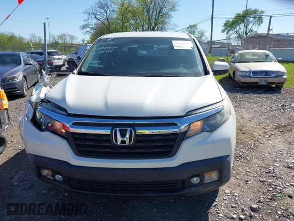 2017 Honda Ridgeline RTL with VIN 5FPYK2F55HB002455, listed as a IAAI auction lot 42032551 with 115,178 mi miles and . Bid and sale history available at DreamBid. Image 12.