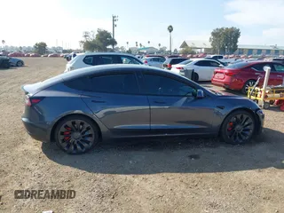 2022 Tesla Model 3 Performance with VIN 5YJ3E1ECXNF264830, listed as a IAAI auction lot 41625494 with Not Provided miles and . Bid and sale history available at carsss.com. Image 12.