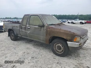 1989 Toyota Pickup DLX z VIN JT4RN93P5K0008068, wystawiony jako Copart lot #58843695 z przebiegiem 285 895 mil mil oraz Tytuł czysty. Historia ofert i sprzedaży dostępna na DreamBid. Obrazek 4.