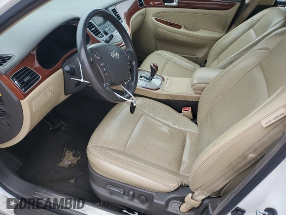 2012 Hyundai Genesis 3.8L with VIN KMHGC4DD2CU192055, listed as a Copart auction lot 70507034 with 131,463 mi miles and Salvage Title. Bid and sale history available at carsss.com. Image 7.