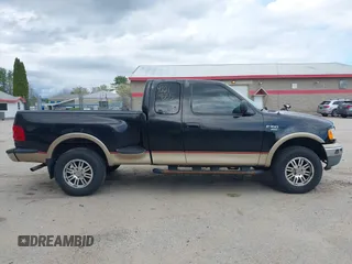 1999 Ford F-150 XL z VIN 2FTRX08L8XCA05595, wystawiony jako IAAI lot #42219555 z przebiegiem 213 636 mil mil oraz . Historia ofert i sprzedaży dostępna na DreamBid. Obrazek 14.
