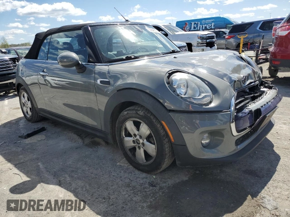 2016 MINI Convertible with VIN WMWWG5C57G3C19380, listed as a Copart auction lot 50645324 with 76,396 mi miles and Salvage title. Bid and sale history available at DreamBid. Image 4.
