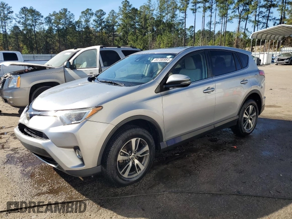 2018 Toyota RAV4 XLE with VIN JTMWFREV1JJ205906, listed as a Copart auction lot 84700564 with 64,953 mi miles and Salvage Title. Bid and sale history available at DreamBid. Image 1.