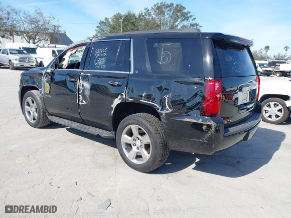 2018 Chevrolet Tahoe LT with VIN 1GNSCBKCXJR132867, listed as a IAAI auction lot 41456319 with 59,131 mi miles. Bid and sale history available at carsss.com. Image 3.