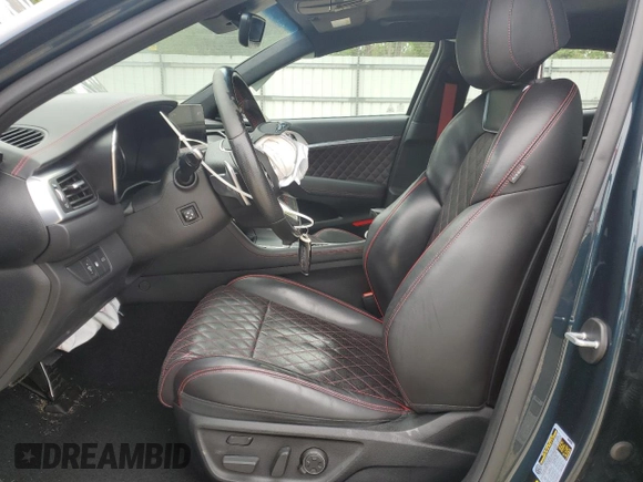 2022 Genesis G70 3.3T with VIN KMTG54TEXNU083193, listed as a Copart auction lot 56627395 with 16,980 mi miles and Salvage title. Bid and sale history available at DreamBid. Image 7.