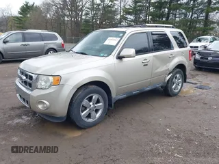 2012 Ford Escape Limited with VIN 1FMCU9EG5CKC24283, listed as a IAAI auction lot 41951067 with 134,666 mi miles. Bid and sale history available at carsss.com. Image 2.