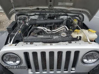 2004 Jeep Wrangler X with VIN 1J4FA39S24P714961, listed as a Copart auction lot 57871235 with 123,164 mi miles and Clean title. Bid and sale history available at DreamBid. Image 11.