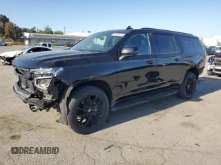 2022 Chevrolet Suburban RST with VIN 1GNSKEKD0NR296633, listed as a Copart auction lot 54446415 with 34,461 mi miles and Salvage title. Bid and sale history available at DreamBid. Image 1.