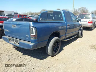 2004 Dodge 1500 SLT with VIN 1D7HA18D14S652784, listed as a IAAI auction lot 41758619 with 186,138 mi miles. Bid and sale history available at carsss.com. Image 4.