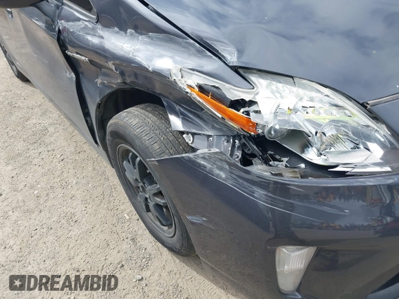 2015 Toyota Prius Four with VIN JTDKN3DU2F1997353, listed as a IAAI auction lot 42181646 with 143,538 mi miles and . Bid and sale history available at DreamBid. Image 6.