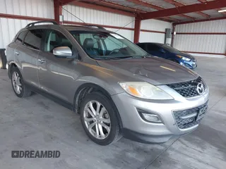 2012 Mazda CX-9 Grand Touring z VIN JM3TB3DV8C0366136, wystawiony jako IAAI lot #42328716 z przebiegiem 192 142 mil mil oraz . Historia ofert i sprzedaży dostępna na DreamBid. Obrazek 1.