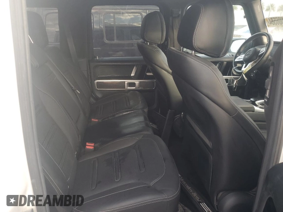 2020 Mercedes-Benz G 550 z VIN W1NYC6BJ1LX345996, wystawiony jako Copart lot #75006584 z przebiegiem 39 091 mil mil oraz Nie do naprawy. Historia ofert i sprzedaży dostępna na DreamBid. Obrazek 11.
