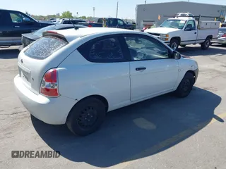 2008 Hyundai Accent GS with VIN KMHCM36CX8U073896, listed as a IAAI auction lot 42088516 with 182,092 mi miles. Bid and sale history available at carsss.com. Image 4.
