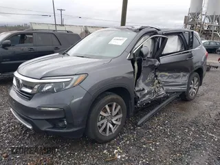 2022 Honda Pilot EX-L with VIN 5FNYF6H57NB038144, listed as a IAAI auction lot 41066857 with 24,551 mi miles. Bid and sale history available at carsss.com. Image 17.