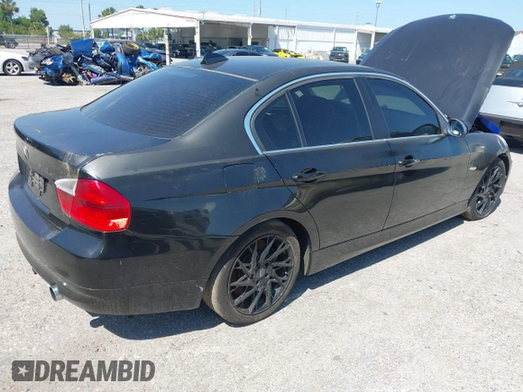 2008 BMW 3 Series 335xi with VIN WBAVD53578A284258, listed as a IAAI auction lot 42050367 with 184,998 mi miles. Bid and sale history available at carsss.com. Image 4.