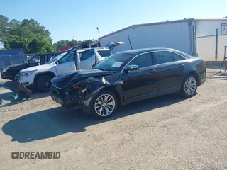 2015 Ford Taurus Limited with VIN 1FAHP2F86FG159974, listed as a IAAI auction lot 42325114 with 147,377 mi miles and . Bid and sale history available at DreamBid. Image 2.