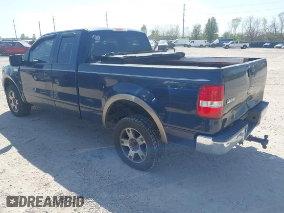 2005 Ford F-150 XLT with VIN 1FTPX14585NB29863, listed as a IAAI auction lot 42117501 with 305,480 mi miles. Bid and sale history available at carsss.com. Image 3.