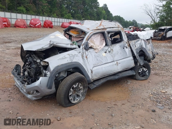 2017 Toyota Tacoma SR5 z VIN 5TFAZ5CN8HX036231, wystawiony jako IAAI lot #37636403 z przebiegiem Nie podano mil oraz . Historia ofert i sprzedaży dostępna na DreamBid. Obrazek 2.