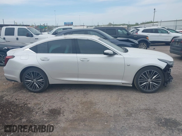 2024 Cadillac CT5 Premium Luxury z VIN 1G6DT5RW3R0129279, wystawiony jako IAAI lot #42011369 z przebiegiem 5 477 mil mil oraz . Historia ofert i sprzedaży dostępna na DreamBid. Obrazek 14.