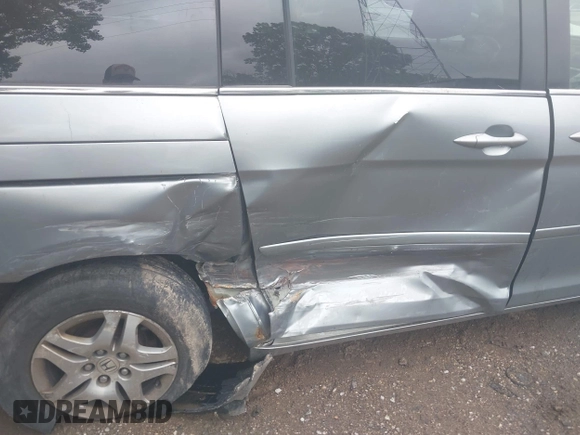 2007 Honda Odyssey EX z VIN 5FNRL38407B084436, wystawiony jako IAAI lot #42355391 z przebiegiem 144 607 mil mil oraz . Historia ofert i sprzedaży dostępna na DreamBid. Obrazek 6.