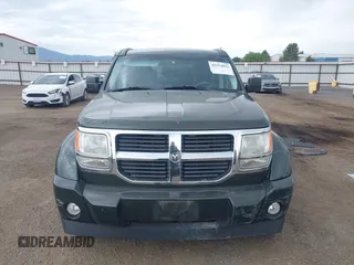 2010 Dodge Nitro SE z VIN 1D4PU2GK4AW125087, wystawiony jako IAAI lot #42554853 z przebiegiem 82 282 mil mil oraz . Historia ofert i sprzedaży dostępna na DreamBid. Obrazek 13.